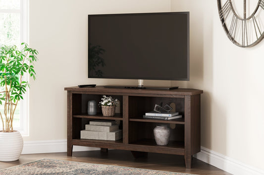 Ashley Express - Camiburg Small Corner TV Stand at Towne & Country Furniture (AL) furniture, home furniture, home decor, sofa, bedding