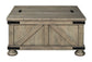 Ashley Express - Aldwin Cocktail Table with Storage at Towne & Country Furniture (AL) furniture, home furniture, home decor, sofa, bedding
