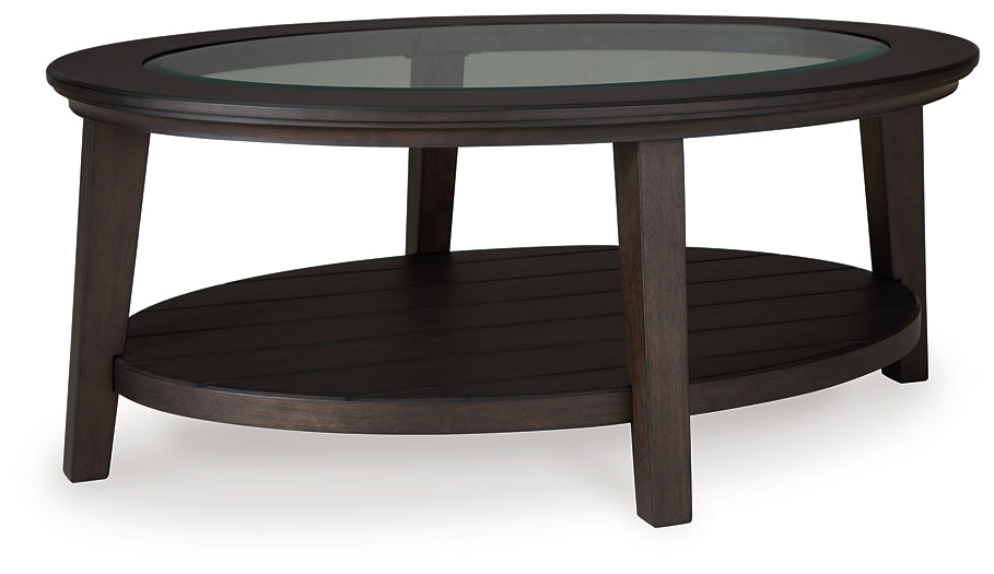 Ashley Express - Celamar Oval Cocktail Table at Towne & Country Furniture (AL) furniture, home furniture, home decor, sofa, bedding