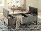Ashley Express - Derrylin Lift Top Cocktail Table at Towne & Country Furniture (AL) furniture, home furniture, home decor, sofa, bedding