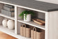 Ashley Express - Dorrinson Medium Corner TV Stand at Towne & Country Furniture (AL) furniture, home furniture, home decor, sofa, bedding