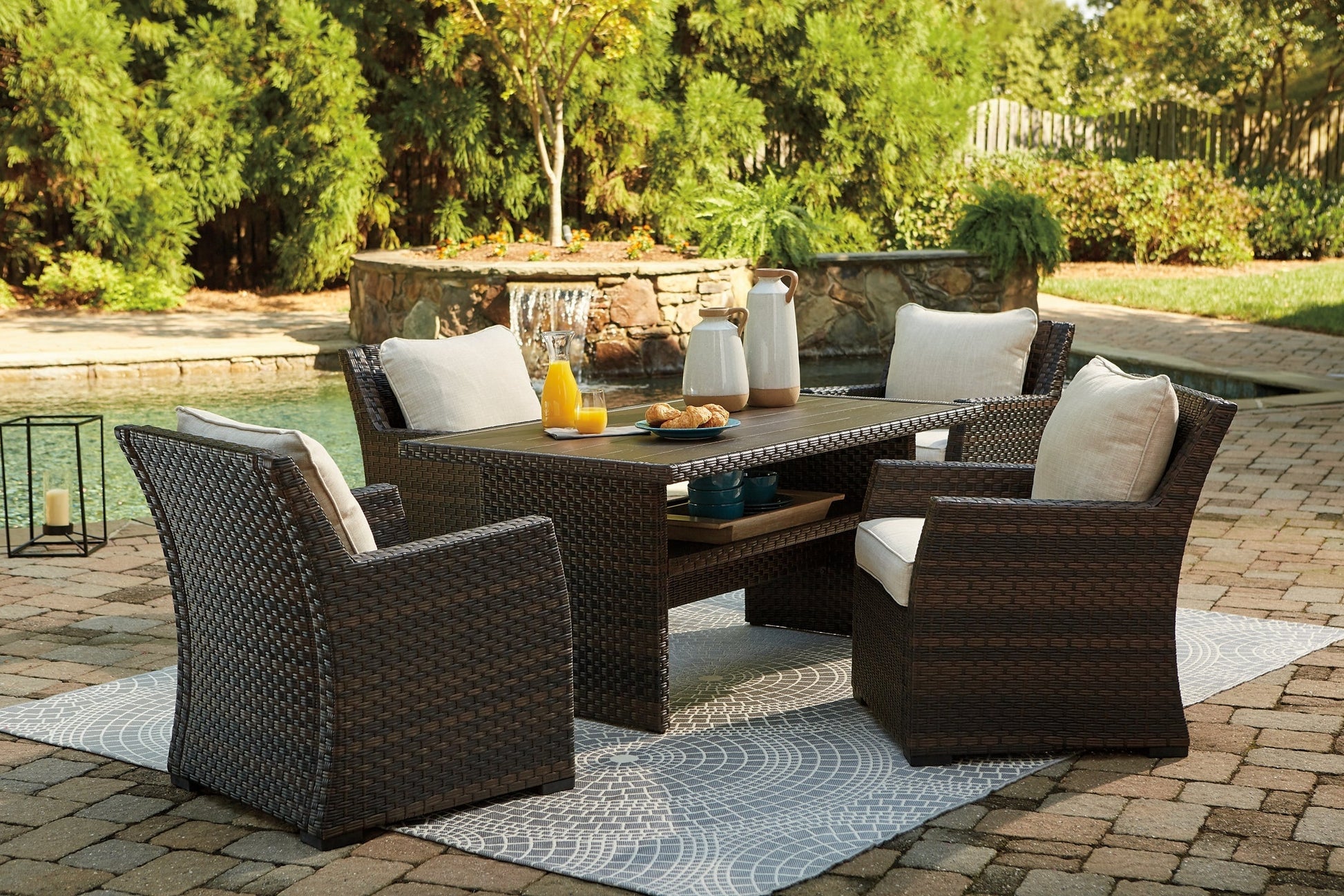 Ashley Express - Easy Isle Outdoor Dining Table and 4 Chairs at Towne & Country Furniture (AL) furniture, home furniture, home decor, sofa, bedding