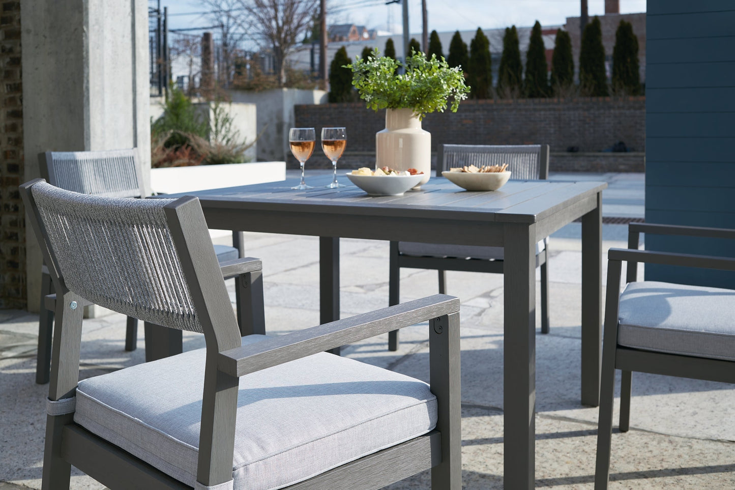 Ashley Express - Eden Town Outdoor Dining Table and 4 Chairs at Towne & Country Furniture (AL) furniture, home furniture, home decor, sofa, bedding