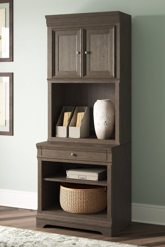 Ashley Express - Janismore Bookcase at Towne & Country Furniture (AL) furniture, home furniture, home decor, sofa, bedding