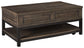 Ashley Express - Johurst LIFT TOP COCKTAIL TABLE at Towne & Country Furniture (AL) furniture, home furniture, home decor, sofa, bedding