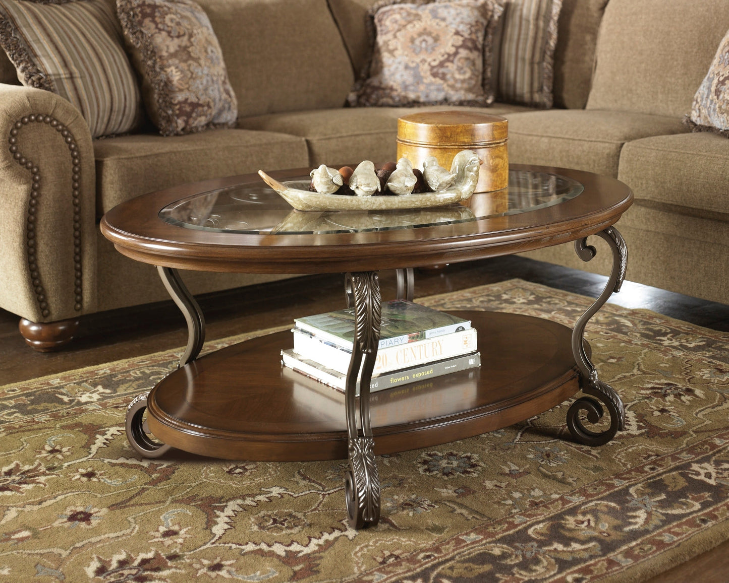Ashley Express - Nestor Oval Cocktail Table at Towne & Country Furniture (AL) furniture, home furniture, home decor, sofa, bedding