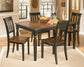 Ashley Express - Owingsville Dining Table and 4 Chairs at Towne & Country Furniture (AL) furniture, home furniture, home decor, sofa, bedding