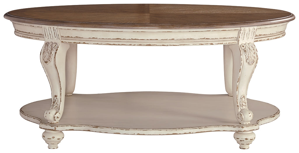 Ashley Express - Realyn Oval Cocktail Table at Towne & Country Furniture (AL) furniture, home furniture, home decor, sofa, bedding