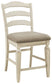 Ashley Express - Realyn Upholstered Barstool (2/CN) at Towne & Country Furniture (AL) furniture, home furniture, home decor, sofa, bedding