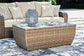 Ashley Express - Sandy Bloom Outdoor Coffee Table with 2 End Tables at Towne & Country Furniture (AL) furniture, home furniture, home decor, sofa, bedding
