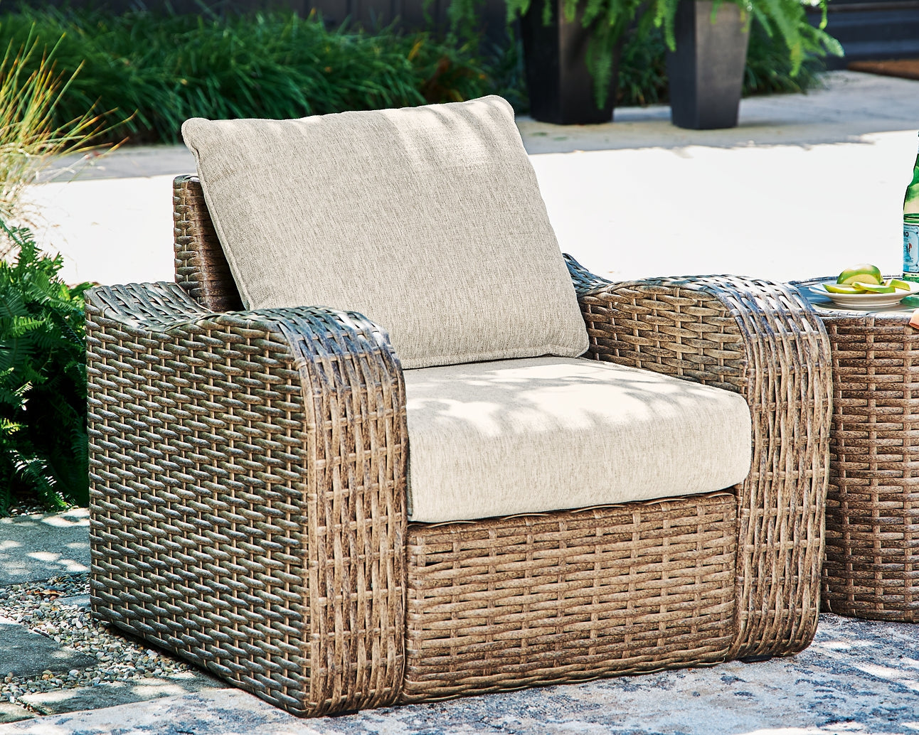 Ashley Express - Sandy Bloom Outdoor Lounge Chair and Ottoman at Towne & Country Furniture (AL) furniture, home furniture, home decor, sofa, bedding
