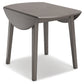 Ashley Express - Shullden Round DRM Drop Leaf Table at Towne & Country Furniture (AL) furniture, home furniture, home decor, sofa, bedding