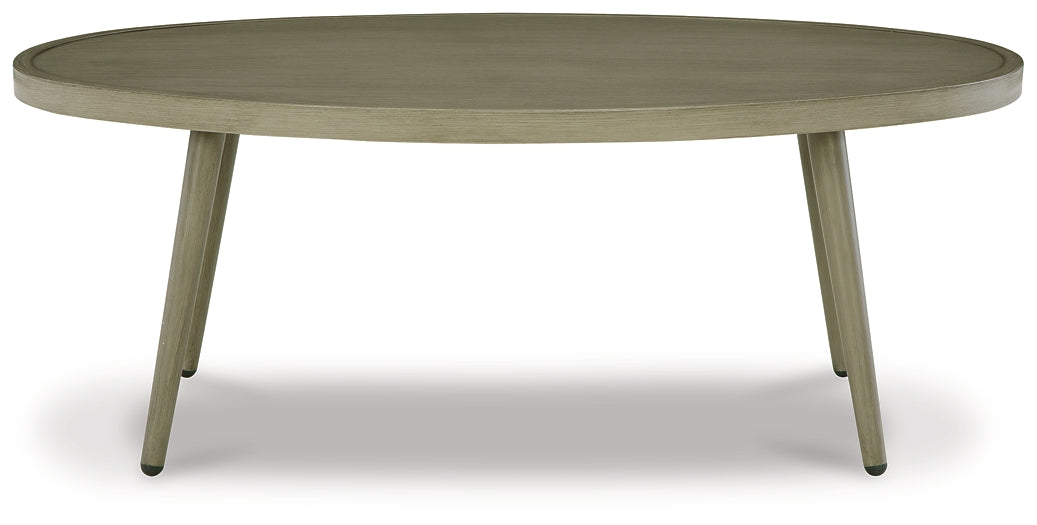 Ashley Express - Swiss Valley Oval Cocktail Table at Towne & Country Furniture (AL) furniture, home furniture, home decor, sofa, bedding