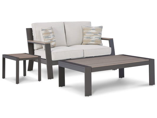 Ashley Express - Tropicava Outdoor Loveseat with Coffee Table and End Table at Towne & Country Furniture (AL) furniture, home furniture, home decor, sofa, bedding