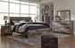 Derekson King Panel Bed with 2 Storage Drawers with Mirrored Dresser, Chest and 2 Nightstands at Towne & Country Furniture (AL) furniture, home furniture, home decor, sofa, bedding