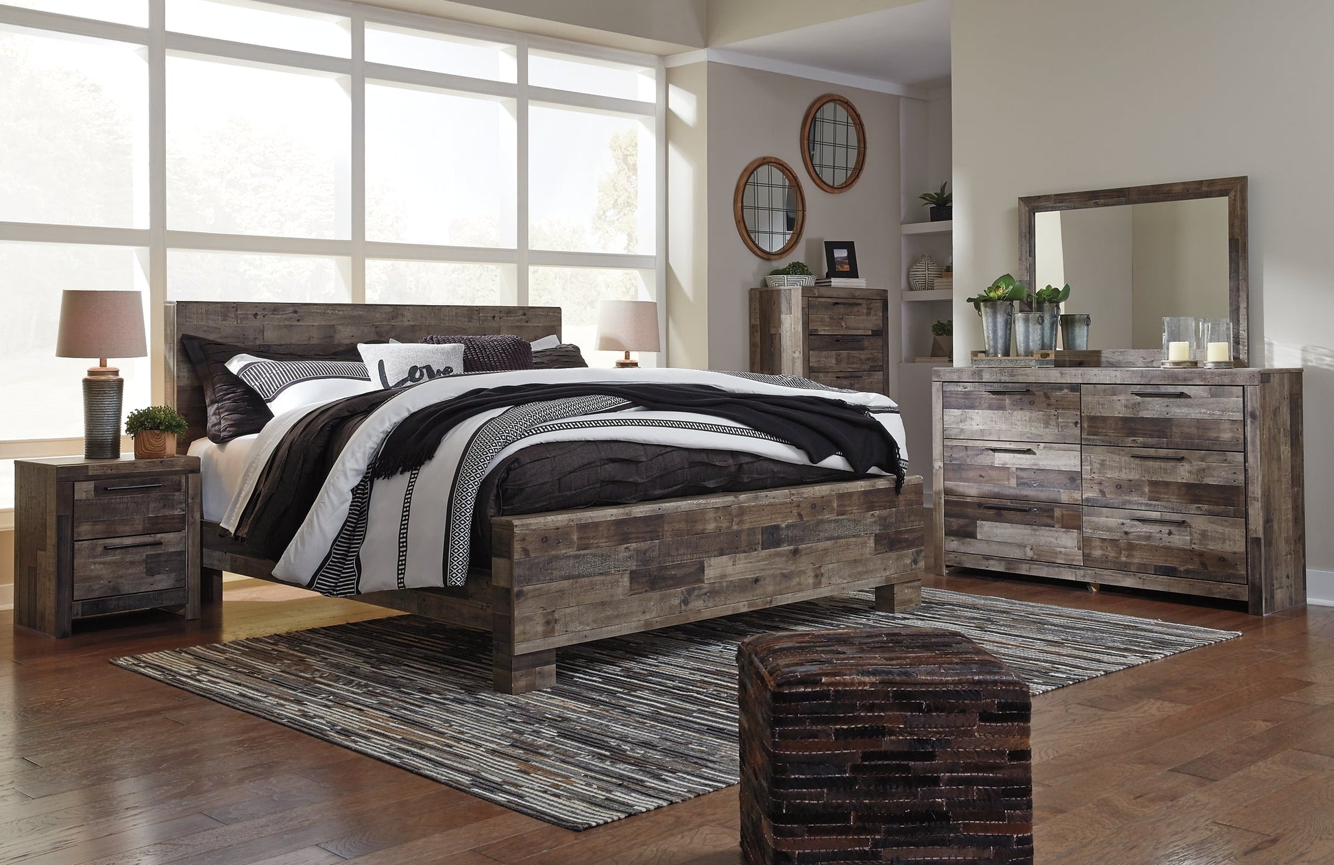 Derekson King Panel Bed with Mirrored Dresser, Chest and Nightstand at Towne & Country Furniture (AL) furniture, home furniture, home decor, sofa, bedding