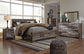 Derekson King Panel Bed with Mirrored Dresser, Chest and Nightstand at Towne & Country Furniture (AL) furniture, home furniture, home decor, sofa, bedding