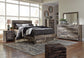 Derekson Queen Panel Bed with 2 Storage Drawers with Mirrored Dresser, Chest and 2 Nightstands at Towne & Country Furniture (AL) furniture, home furniture, home decor, sofa, bedding