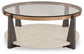 Frazwa Round Cocktail Table at Towne & Country Furniture (AL) furniture, home furniture, home decor, sofa, bedding