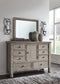 Harrastone Queen Panel Bed with Mirrored Dresser at Towne & Country Furniture (AL) furniture, home furniture, home decor, sofa, bedding