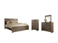 Juararo Queen Panel Bed with Mirrored Dresser and Chest at Towne & Country Furniture (AL) furniture, home furniture, home decor, sofa, bedding