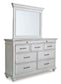 Kanwyn King Panel Bed with Mirrored Dresser, Chest and 2 Nightstands at Towne & Country Furniture (AL) furniture, home furniture, home decor, sofa, bedding