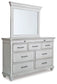 Kanwyn King Panel Bed with Mirrored Dresser at Towne & Country Furniture (AL) furniture, home furniture, home decor, sofa, bedding