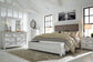 Kanwyn Queen Panel Bed with Storage with Mirrored Dresser and 2 Nightstands at Towne & Country Furniture (AL) furniture, home furniture, home decor, sofa, bedding