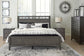 Montillan California King Panel Bed with Mirrored Dresser, Chest and 2 Nightstands at Towne & Country Furniture (AL) furniture, home furniture, home decor, sofa, bedding