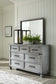 Russelyn King Storage Bed with Mirrored Dresser at Towne & Country Furniture (AL) furniture, home furniture, home decor, sofa, bedding