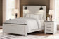Schoenberg Queen Panel Bed with Mirrored Dresser and Chest at Towne & Country Furniture (AL) furniture, home furniture, home decor, sofa, bedding