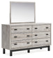 Vessalli King Panel Bed with Mirrored Dresser and Chest at Towne & Country Furniture (AL) furniture, home furniture, home decor, sofa, bedding