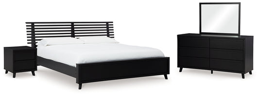 Danziar Queen Panel Bed with Mirrored Dresser and Nightstand